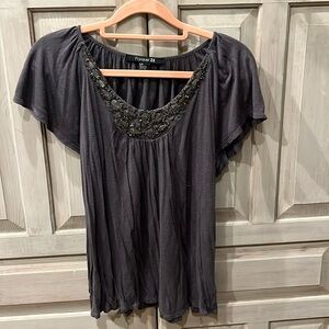 Dark grey, loose fit top, with beaded neckline